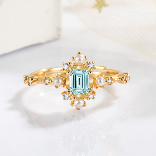 Natural Sky Blue Topaz with Shells 10k Gold Finish Ring